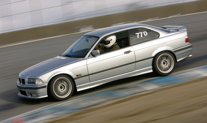 BMW E36 racing at Laguna Seca, Side Shot at Turn 8A.